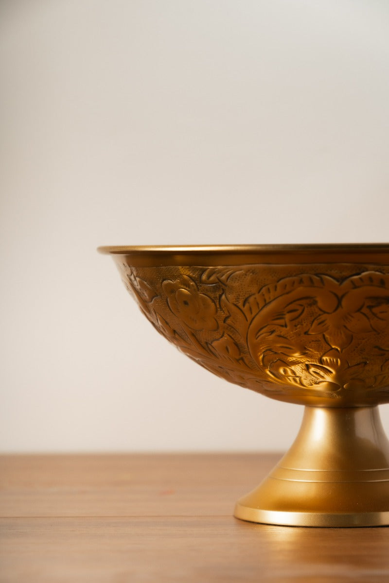 Close-up of the embossed pattern inside the brass bowl