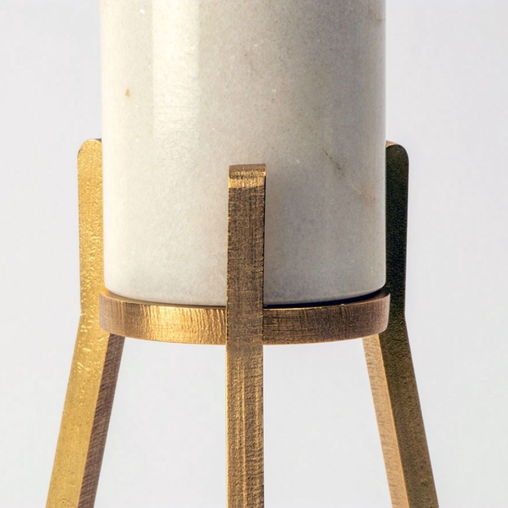 Close up of the white marble Fyre taper candle holder