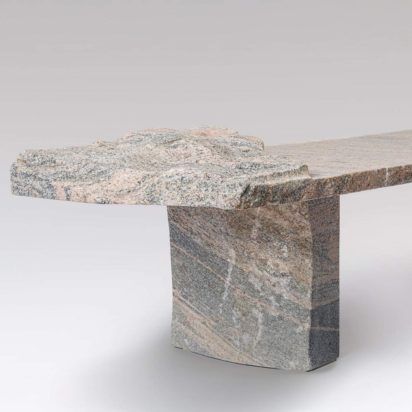The Drift Sculptural Bench | Hand-Carved Pink Granite