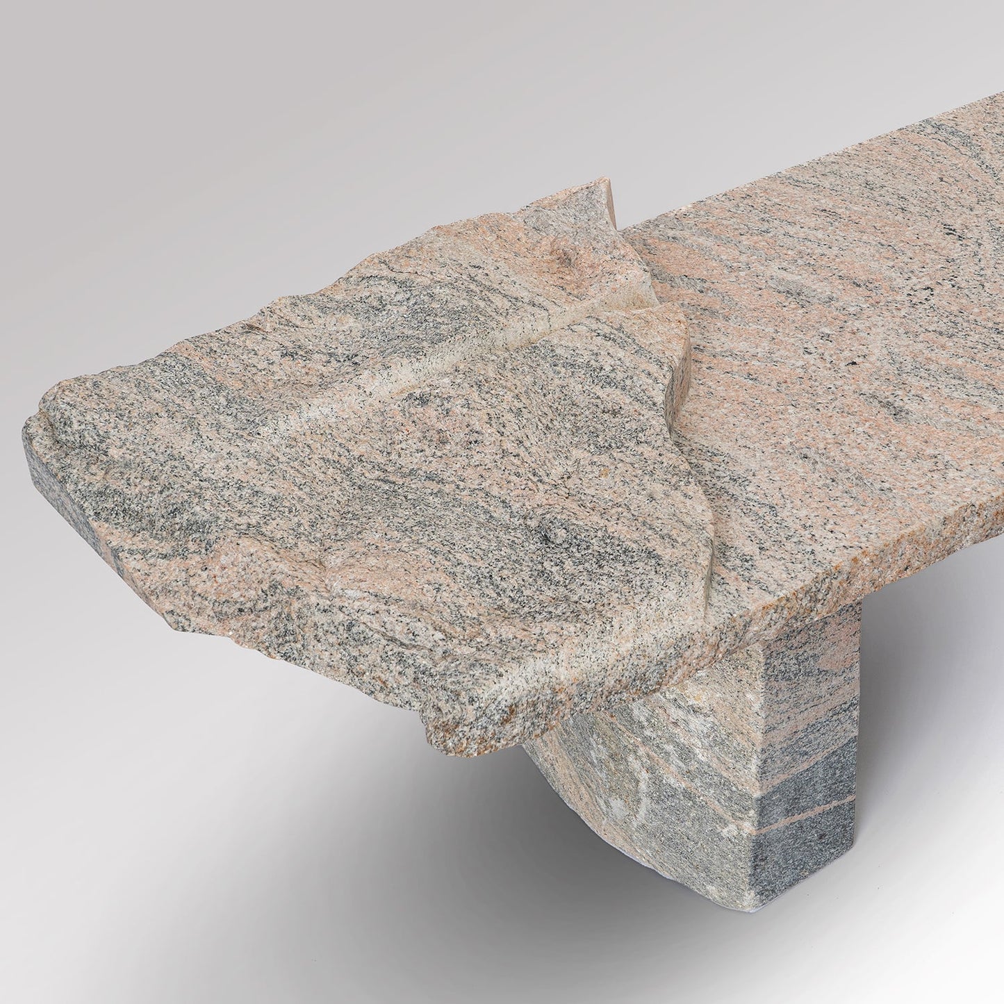 The Drift Sculptural Bench | Hand-Carved Pink Granite