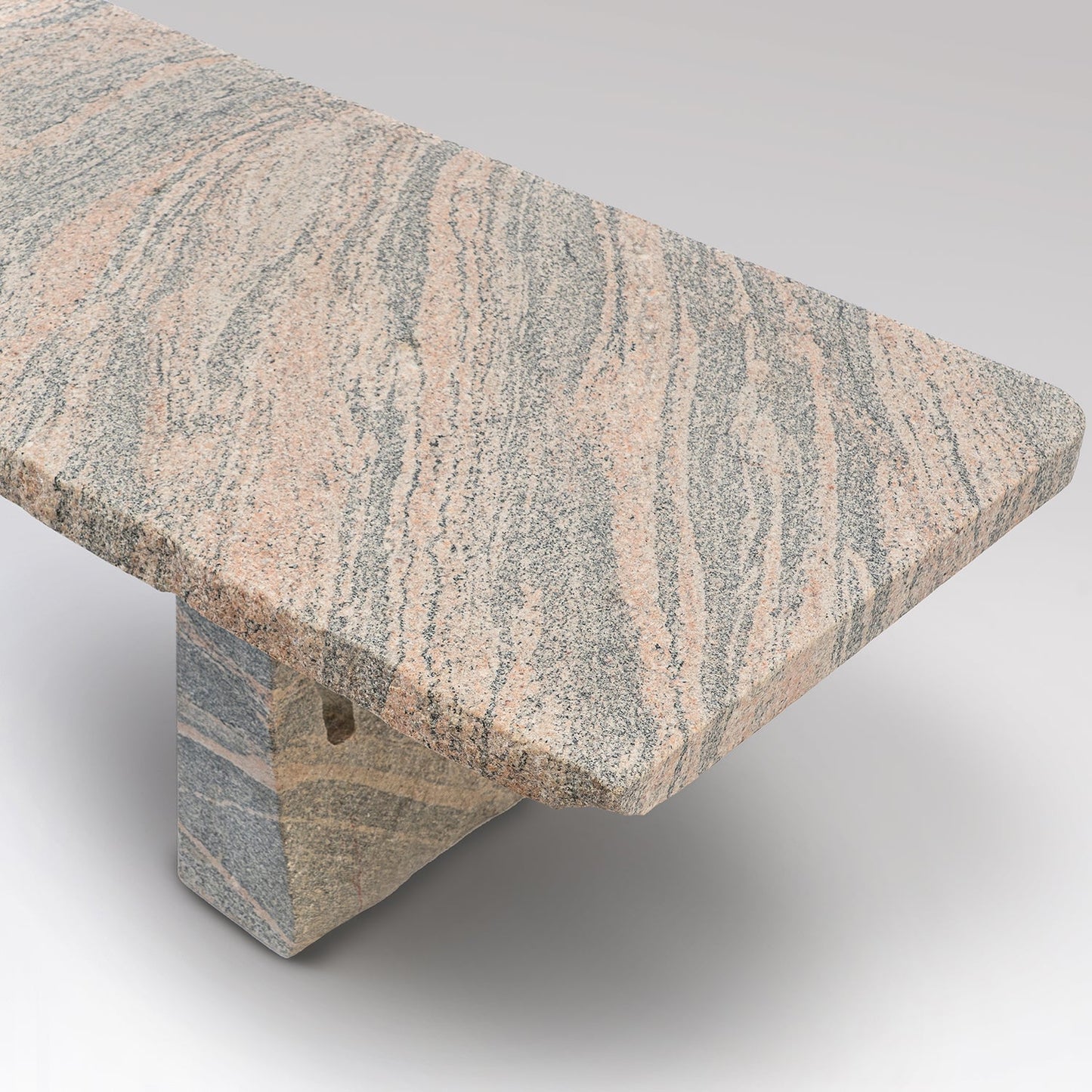 The Drift Sculptural Bench | Hand-Carved Pink Granite