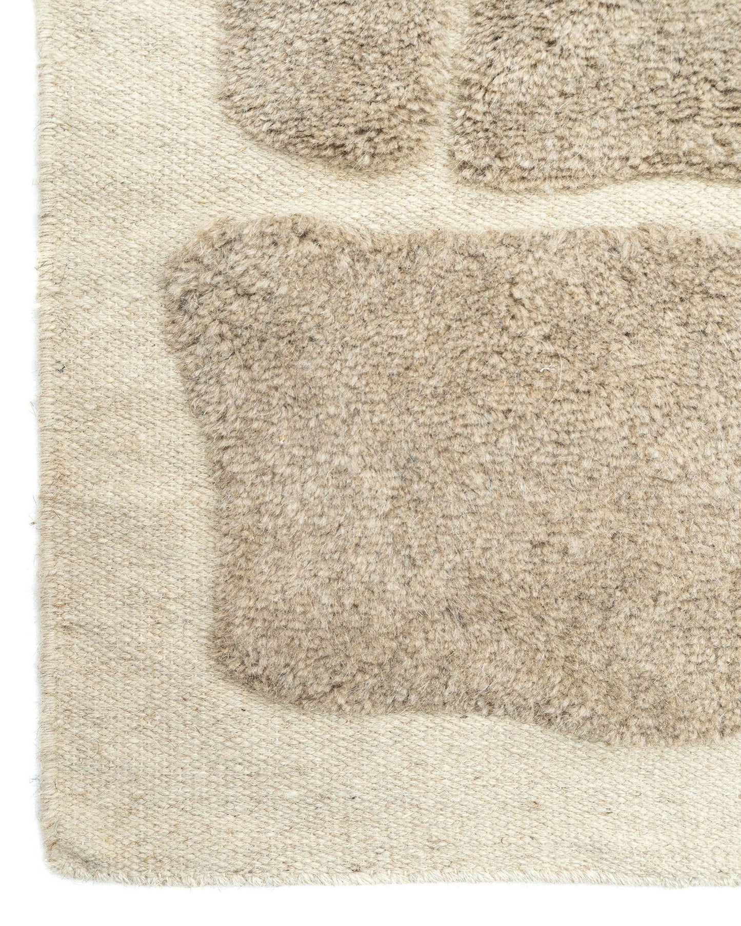 Mould Cast Wool Rug | Popyuli