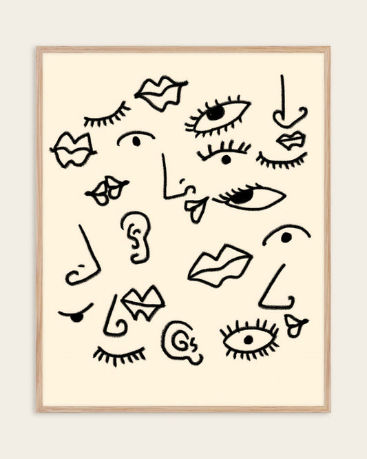 Senses black line art print of eyes, lips, noses and ears on a cream background