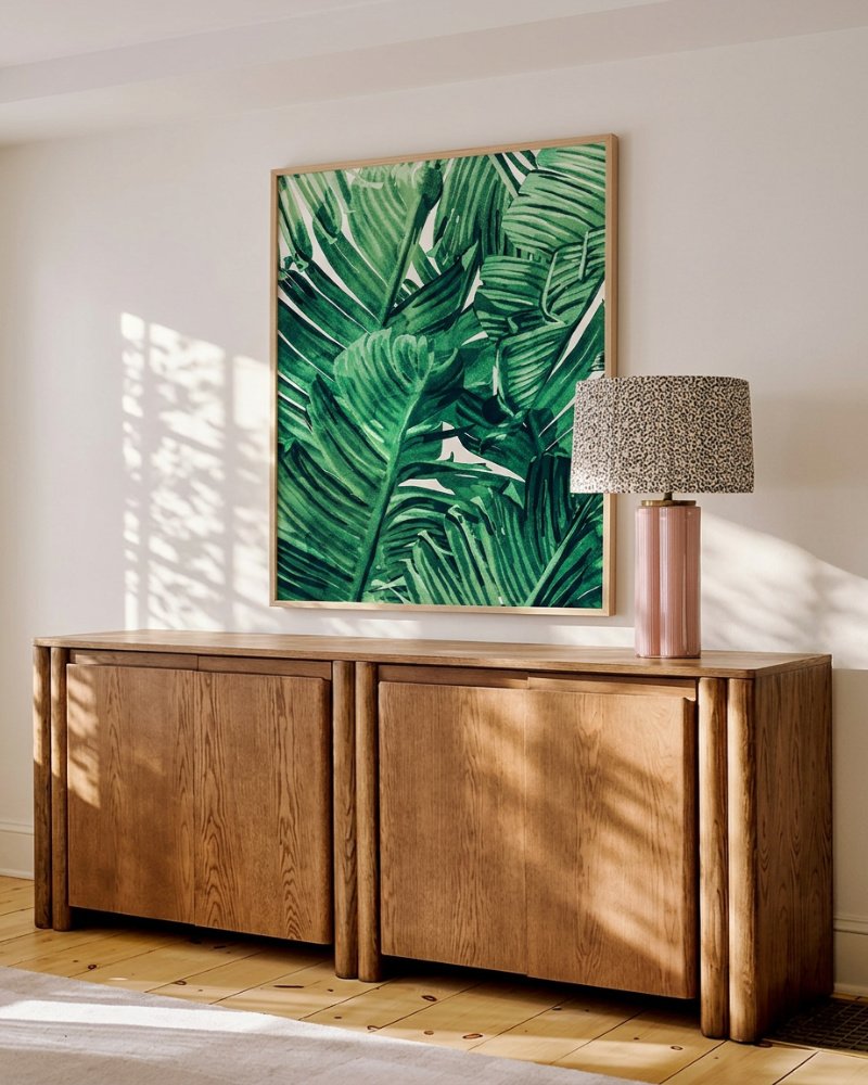 Tropical State of Mind green watercolor banana leaf botanical art print styled in a room