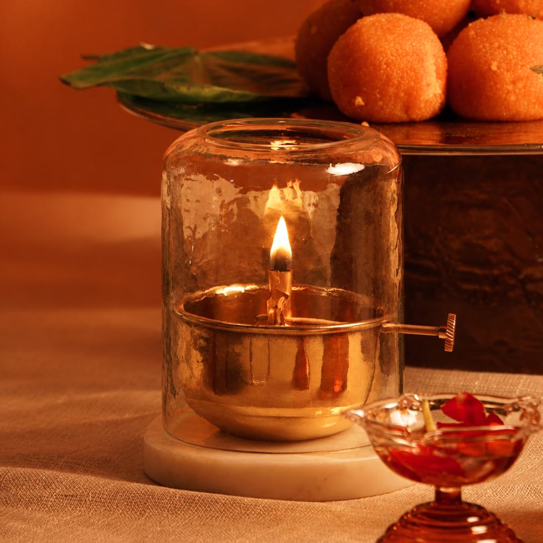 Akhand Jyot diya lit for puja on a festive table