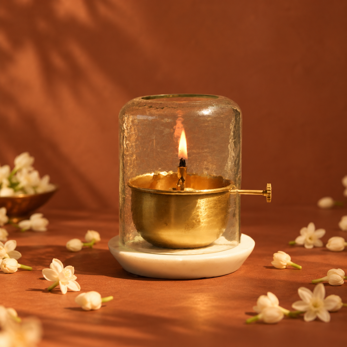 Akhand Jyot diya with jasmine flowers
