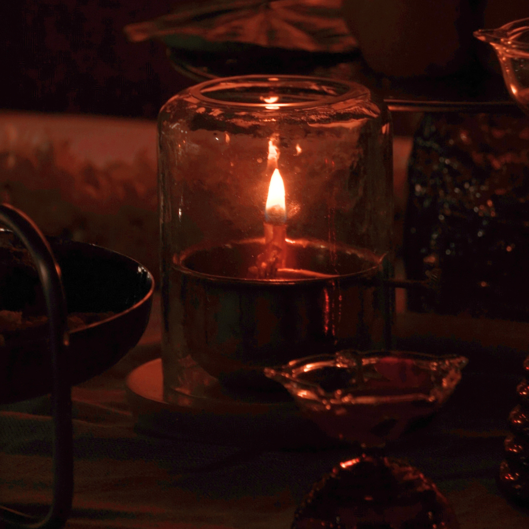 Akhand Jyot diya glowing in a dark room