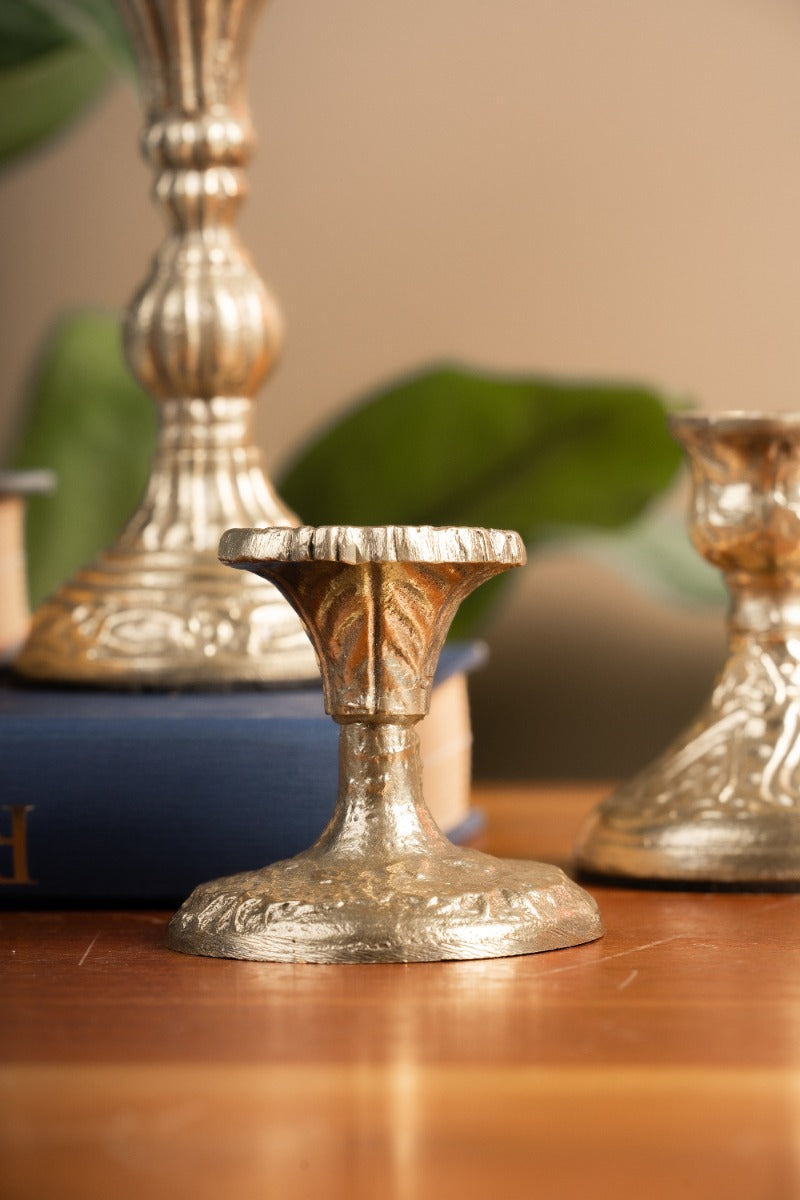 Close-up of embossed detailing on a candle holder