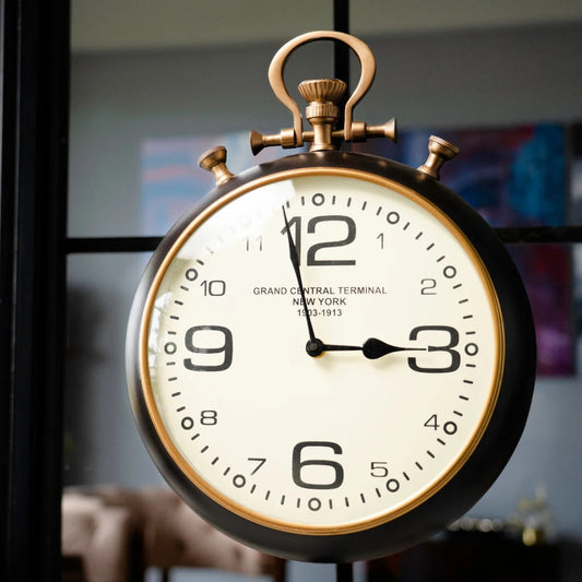 Pocket watch style wall clock in a living space