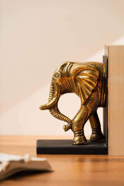 Carved detailing on the gold elephant bookend