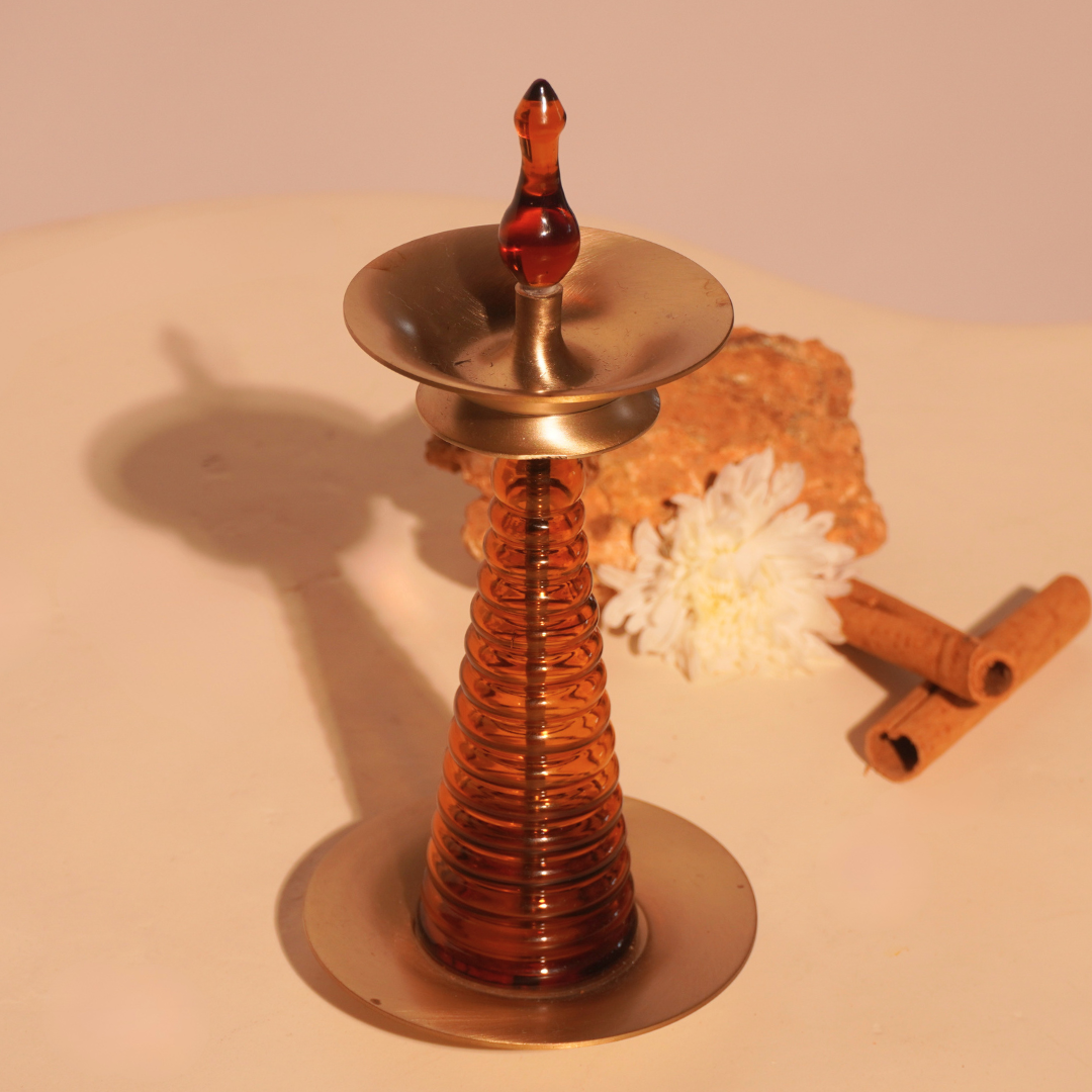 Nilavilakku oil lamp with amber glass coil and brass oil plate