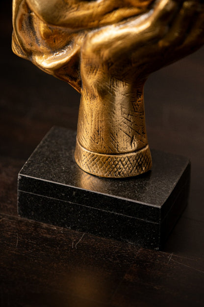 Detail of the hand and marble base