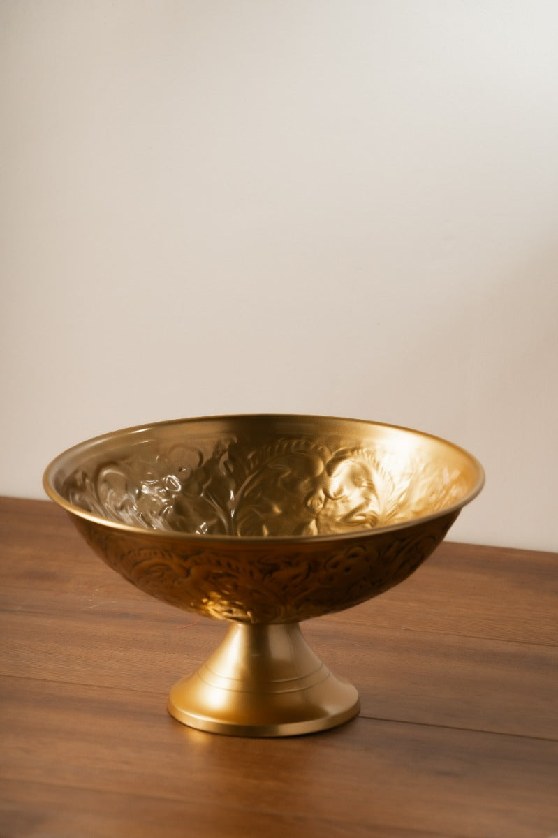 Footed brass bowl with embossed detailing
