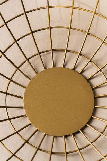 Top view of the gold wire basket and its solid round base