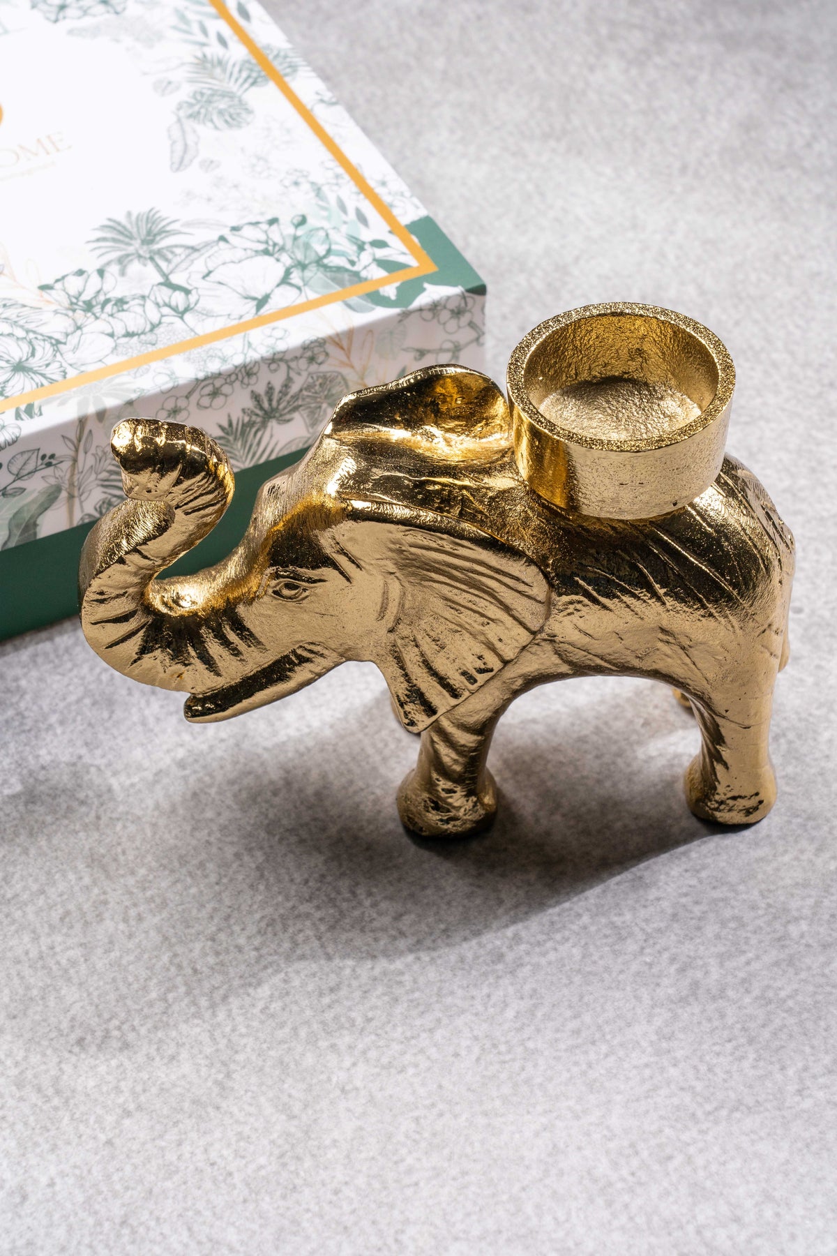 Elephant tealight holder beside its gift box