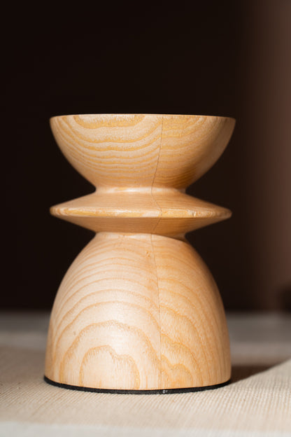 Sculptural turned-wood pillar candle holder