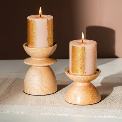 Pair of wooden pillar candle holders in two heights